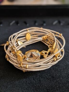 Smadar Eliasaf (SEA) wrap-around leather bracelet features multiple light-color